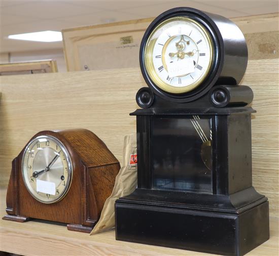 A late 19th century French ebonised mantel clock and a later oak mantel clock tallest 41cm